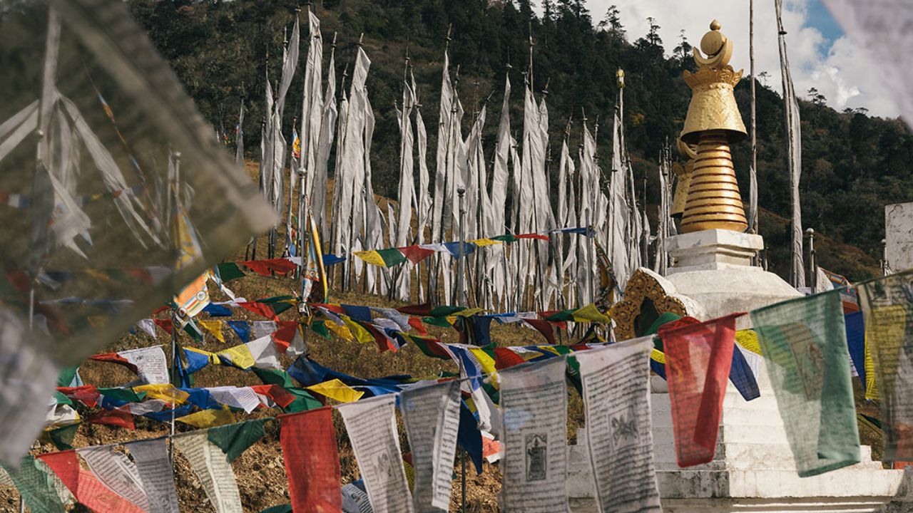 Views of Phobjikha Valley with open plains and surrounding mountains.
